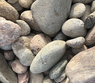 2" - 4" Colorado River Rock for landscaping.